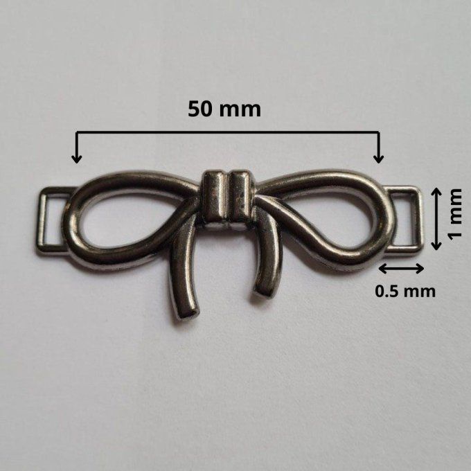 Boucle métal décorative noeud à la pièce