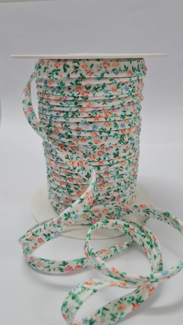 Passepoil coton fleuri orange au mètre